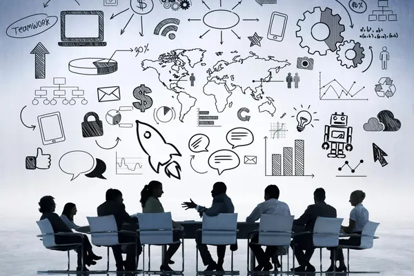 Business team discussing ideas with technology and innovation icons above them.
